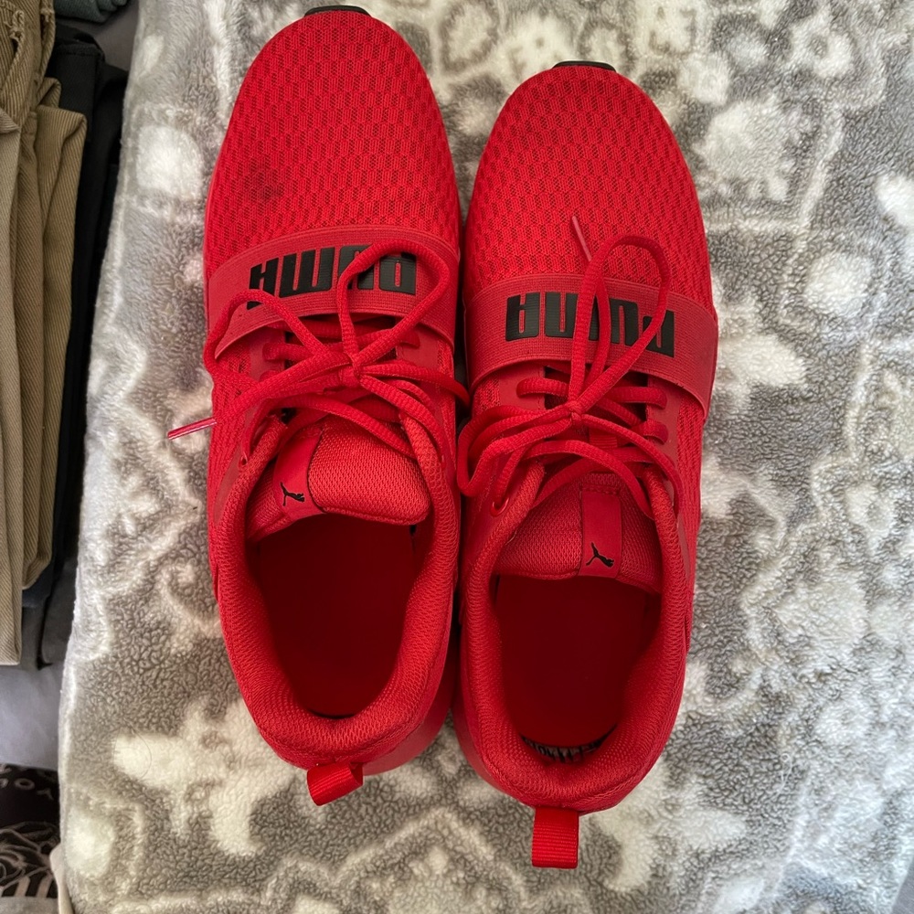 Puma gym shoes 
Red 9 1/2 used a few times 
No box 
$20 each